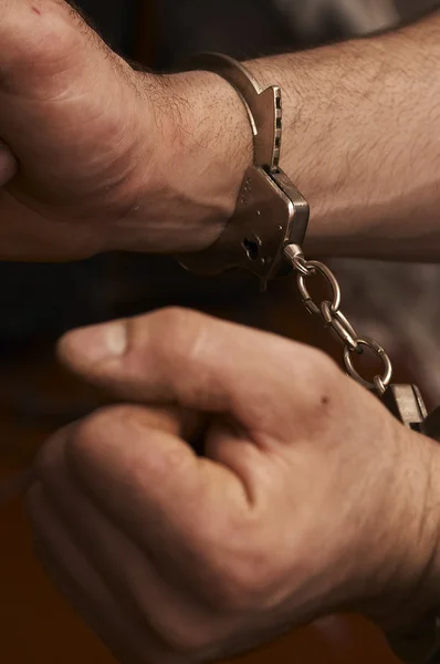 Handcuffed men — Stock Photo, Image