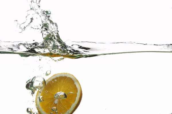 Pomarańczowy rozpryskiwania wody — Zdjęcie stockowe