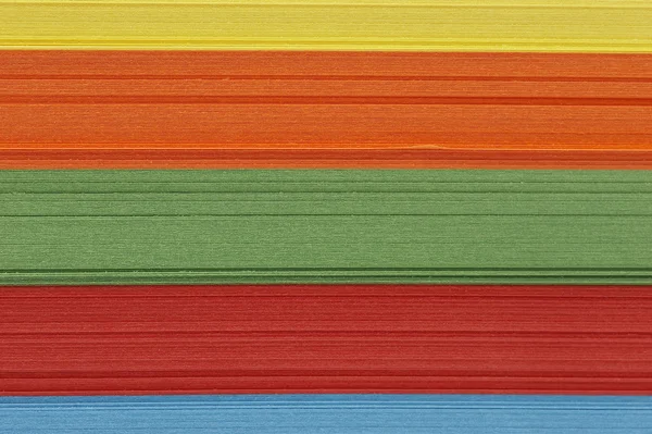 Цветной бумажный фон — стоковое фото