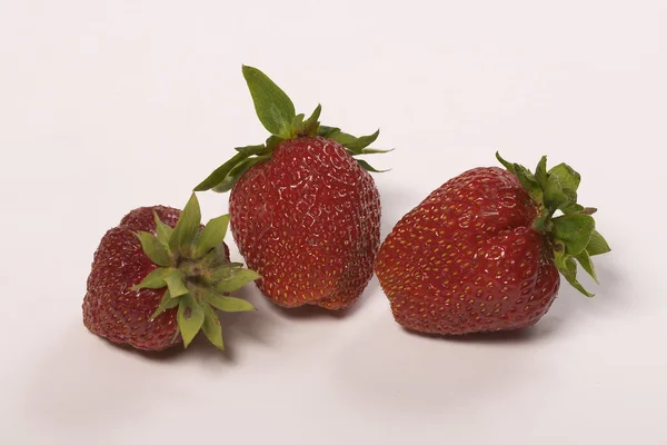 Three isolated strawberry — Stock Photo, Image
