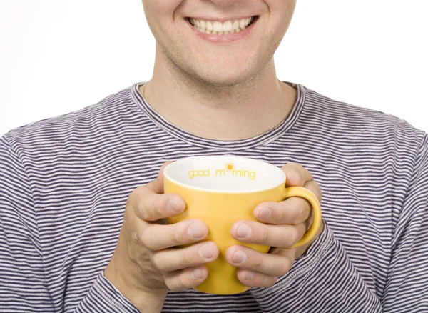 Man with a yellow cup — Stock Photo, Image