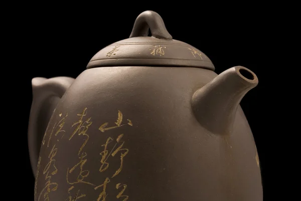 黑色背景上的茶壶 — 图库照片