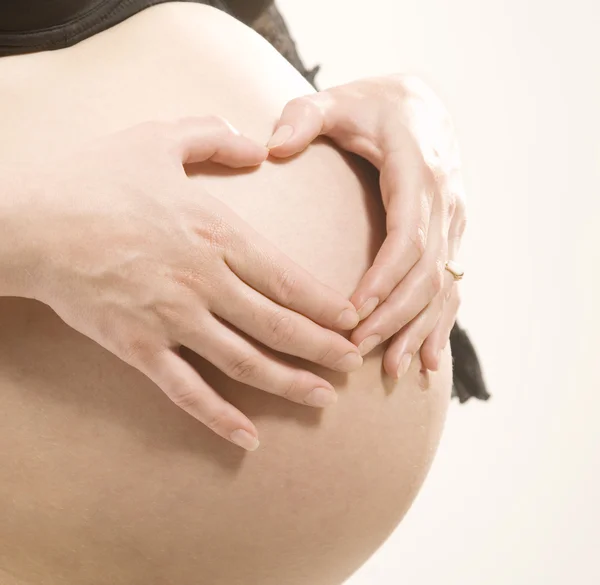 Barriga de mulher grávida — Fotografia de Stock