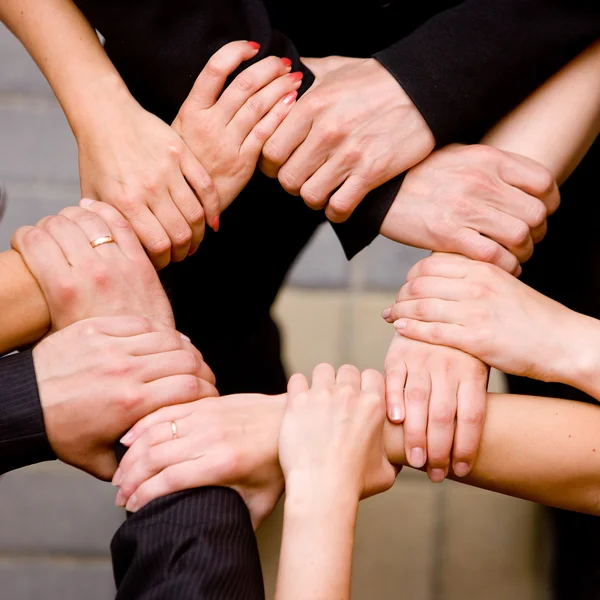 Close up of hands hold together — Stock Photo, Image