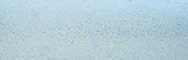 Макрос бульбашок блакитного повітря у воді — стокове фото