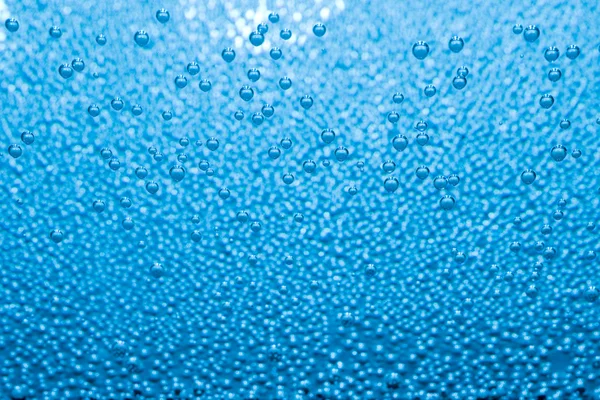 Makro mavi hava kabarcıkları su — Stok fotoğraf