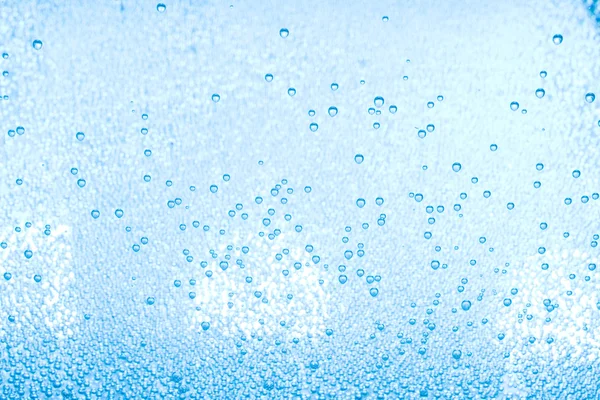 Macro de bulles d'air bleues dans l'eau — Photo