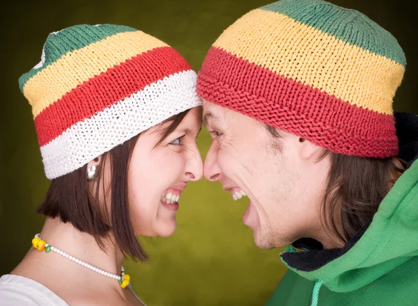 Pair in reggae hats that scream — Stock Photo, Image