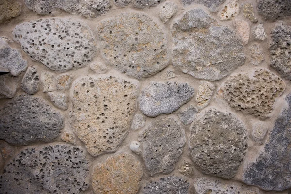 Pedras de granito cinza montadas na parede — Fotografia de Stock