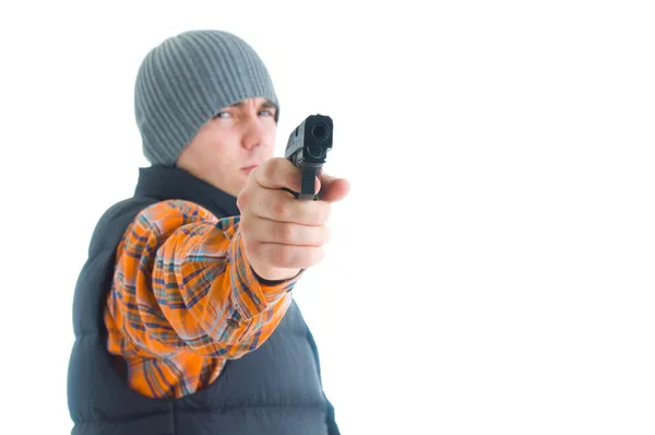 Jovem está apontando com arma — Fotografia de Stock