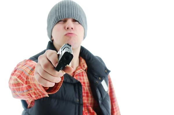 Young man is aiming with gun — Stock Photo, Image