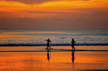 Running on the beach clipart