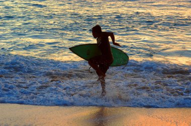 Surfer in Bali clipart