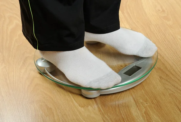 Feet on weight scale — Stock Photo, Image