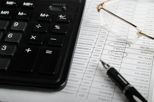 stock image Calculator, pen and glasses