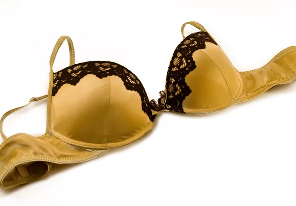 stock image Beautiful golden brassiere on white