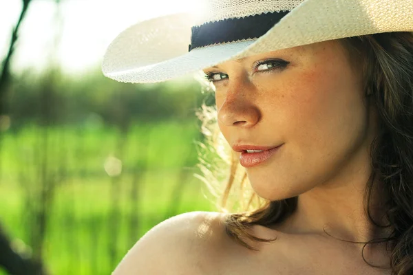 Portrait of young woman cowgirl in hat — Stock Photo, Image