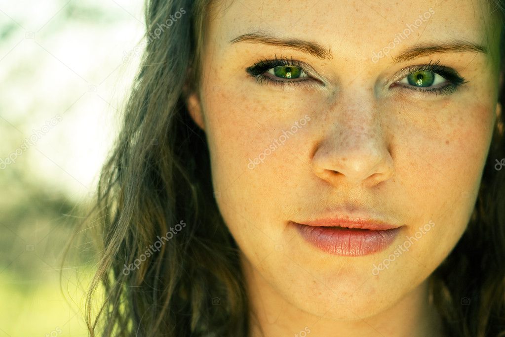 Beautiful woman with green eyes