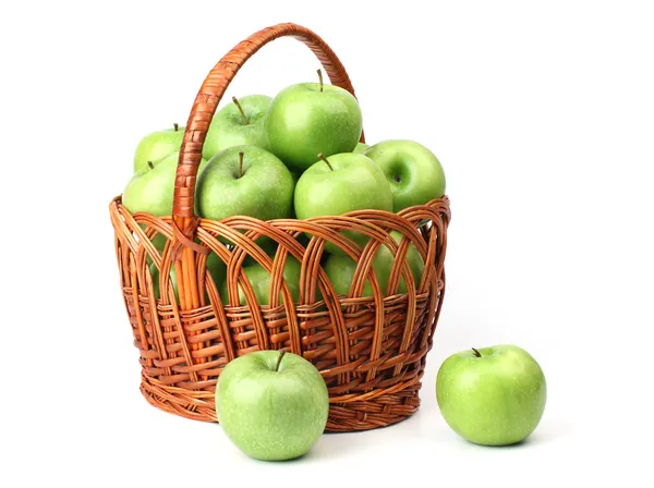 Panier aux pommes vertes . Photo De Stock