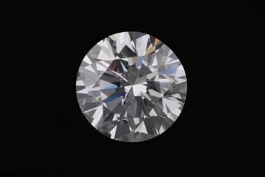 Diamond on a black background. clipart