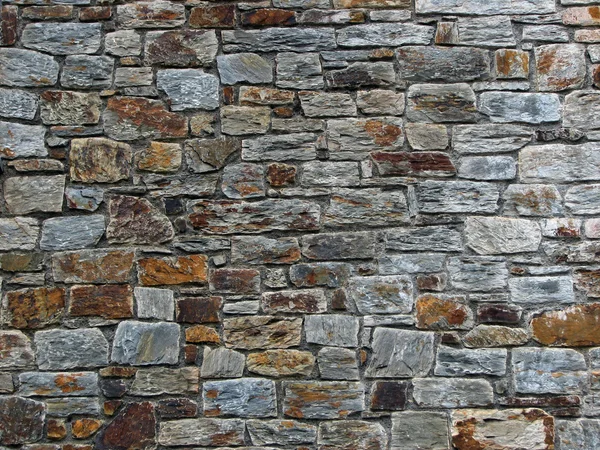 Pared construida en piedra natural rectangular — Foto de Stock