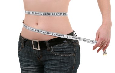 Measuring tape around a waist, woman. clipart