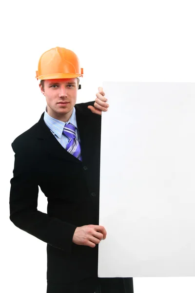 Jovem trabalhador de construção isolado em branco — Fotografia de Stock