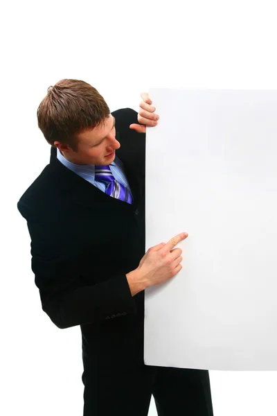 Beyaz bir arka plan üzerinde beyaz kart ile iş adamı — Stok fotoğraf