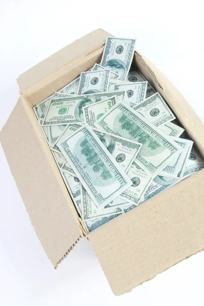 Коробка и падающие деньги — стоковое фото