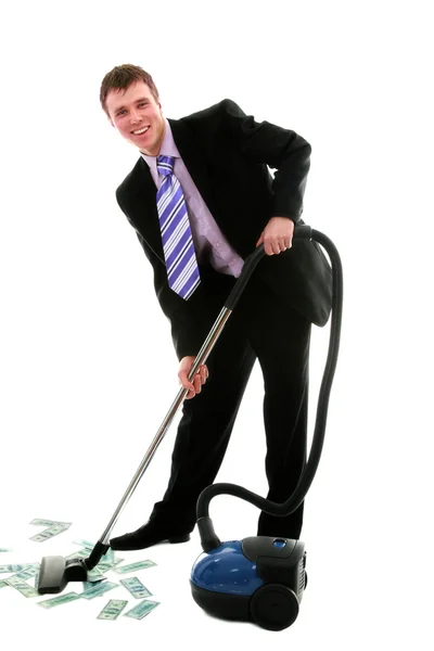 The businessman with a vacuum cleaner — Stock Photo, Image