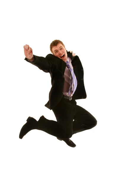 Saltando joven empresario aislado sobre un fondo blanco — Foto de Stock