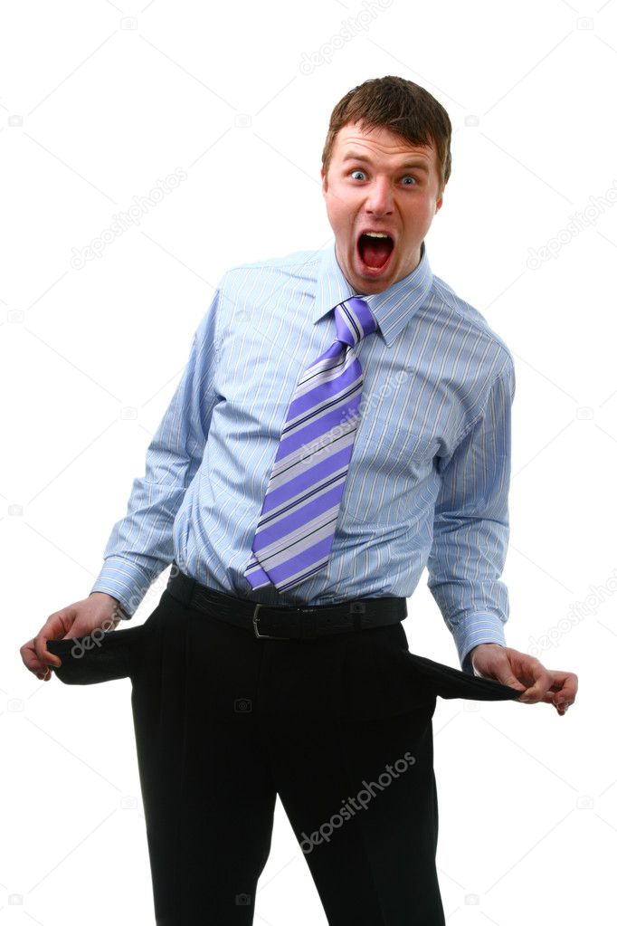 Young businessman showing empty pockets, no cash — Stock Photo