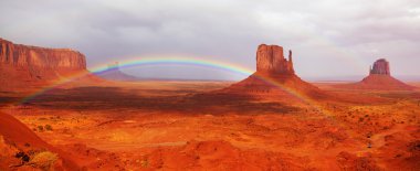 Magnificent rainbow in Monuments Valley clipart