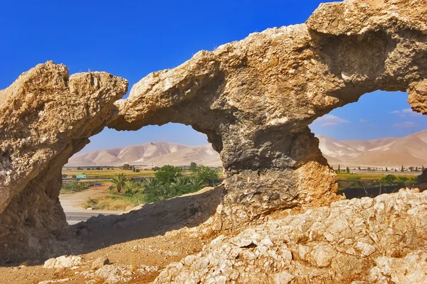 Natural arches in ancient mountains. — Stock Photo, Image