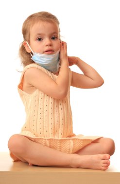 Girl with medical mask. clipart