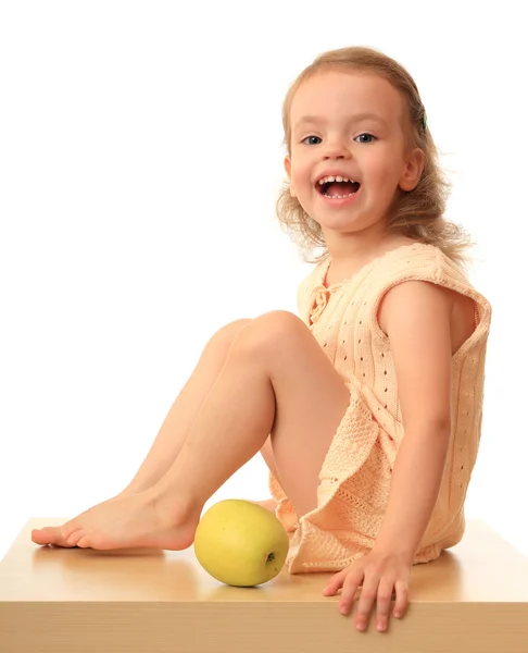 Girl with an apple. — Stock Photo, Image