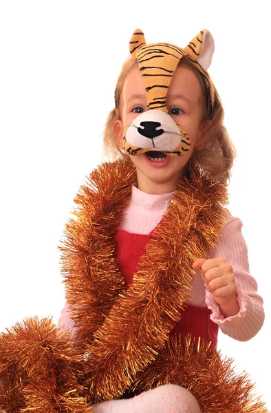 Egy kislány van a maszkban, tigris. — Stock Fotó