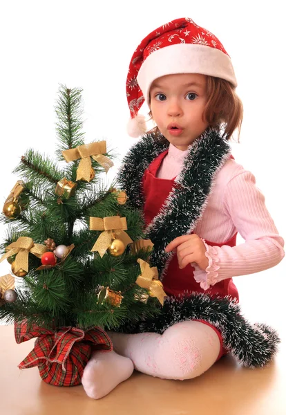 Dívka s novoročním stromem. — Stock fotografie