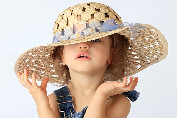 A girl is in a hat. — Stock Photo, Image