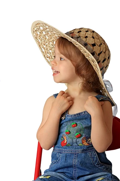 En flicka är i en hatt. — Stockfoto