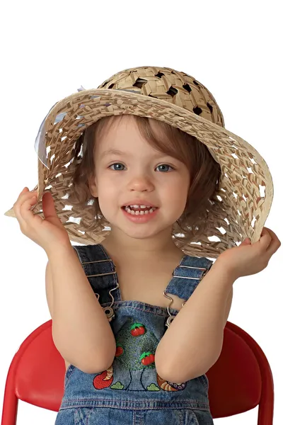 Ένα κορίτσι που είναι σε ένα καπέλο. — Φωτογραφία Αρχείου