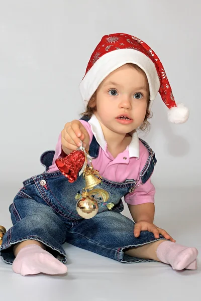 Dívka je v vánoční čepice. — Stock fotografie