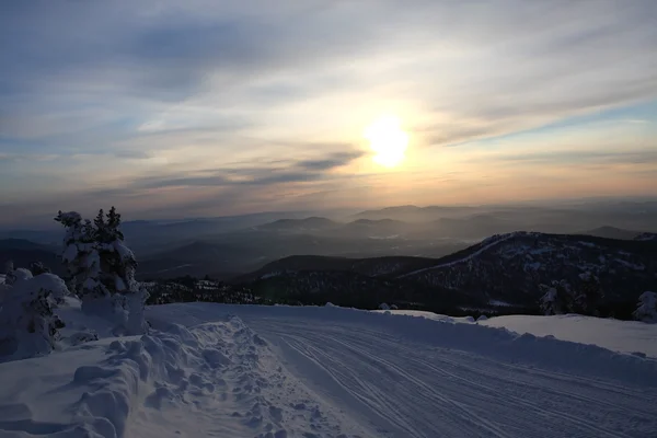 stock image Sunset is in mountains.