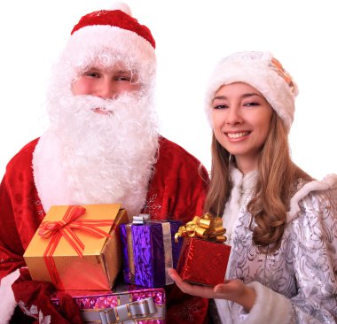 Santa Claus and a Snowmaiden with gifts. clipart