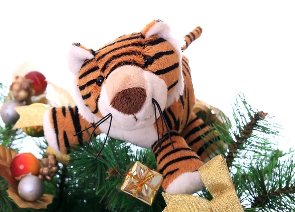Tiger cub on a new-year tree. — Stock Photo, Image