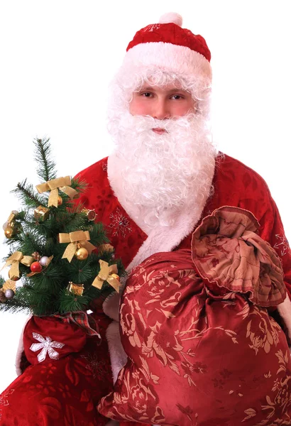 Kerstman met een zak met geschenken. — Stockfoto