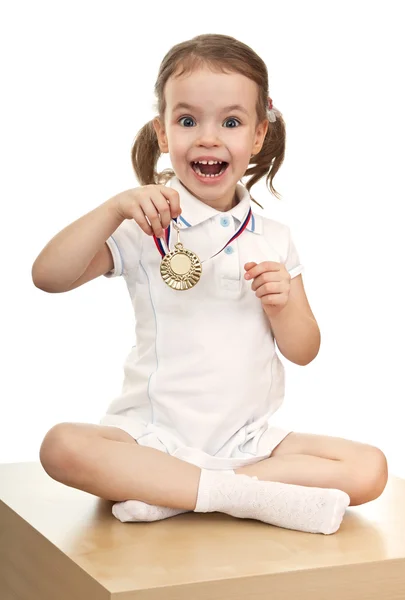 Girl with a gold medal — Stock Photo, Image