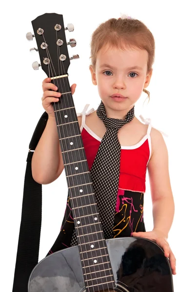 Liten flicka med stora gitarr. — Stockfoto