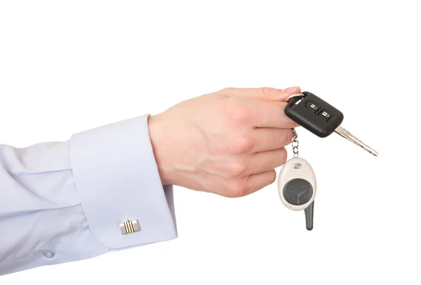 Hand van een man met de sleutels tot de auto. — Stockfoto