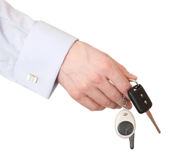 Arabanın anahtarları ile bir adamın elini. — Stok fotoğraf